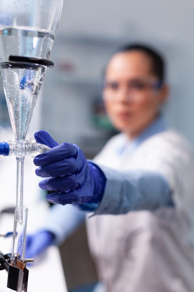 IV Therapy at Home in Dubai - Healing Hands Healthcare 1 specialist chemist woman working biochemistry experiment using professional biology tools